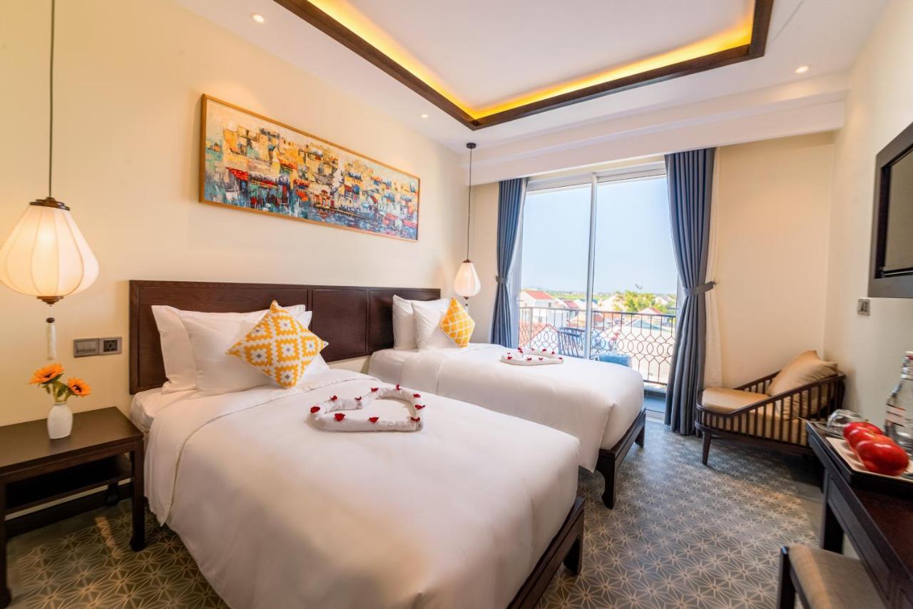 Hoi An Merrily De Art Hotel Bagian luar foto