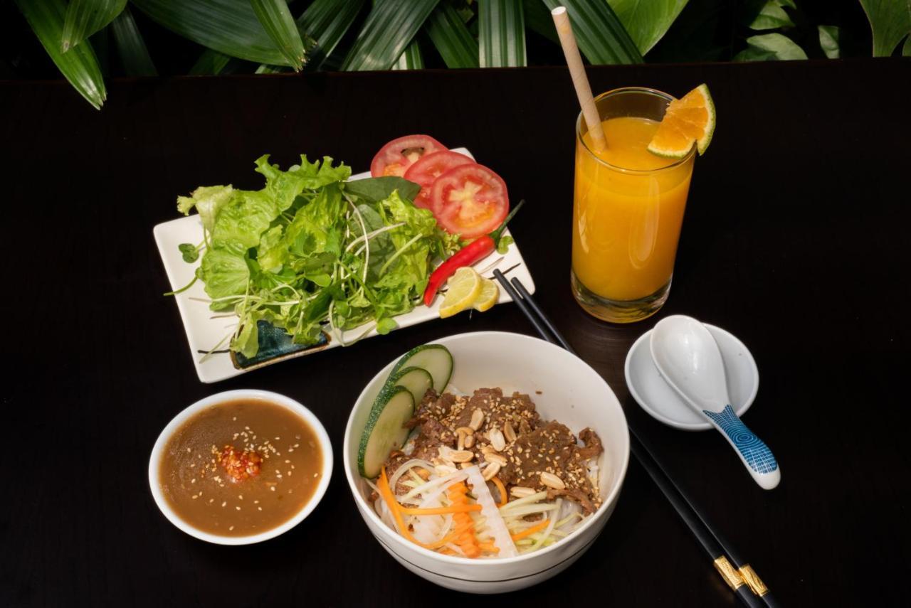Hoi An Merrily De Art Hotel Bagian luar foto