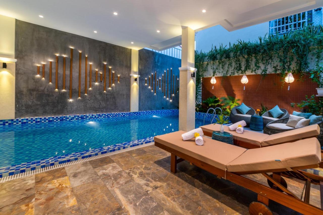 Hoi An Merrily De Art Hotel Bagian luar foto
