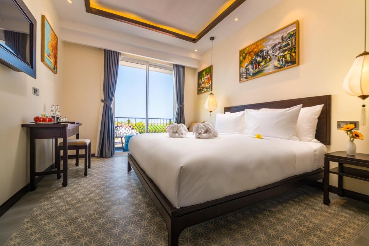 Hoi An Merrily De Art Hotel Bagian luar foto
