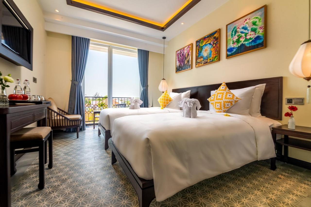 Hoi An Merrily De Art Hotel Bagian luar foto